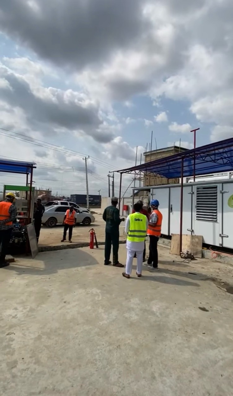 Technical team inspecting integrated CNG equipment